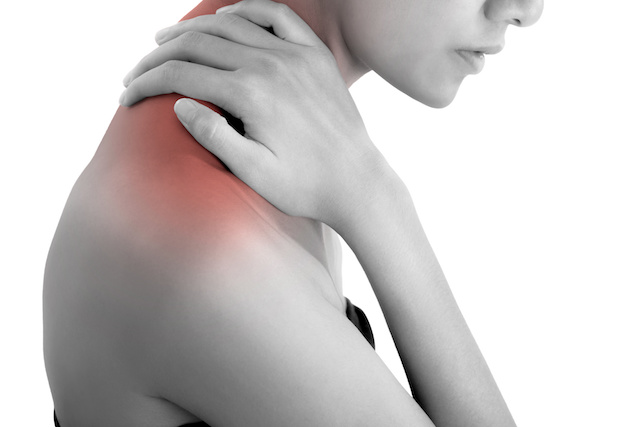 woman hand holding her neck and massaging in pain area black and white color with red highlighted, Isolated on white background.